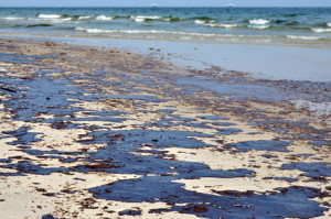 Oil spill on the beach